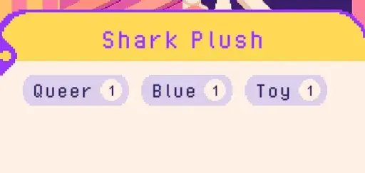 Screenshot from a game with the item name "Shark Plush", below the item name are three categories it belongs in: "Queer", "Blue", and "Toy". 